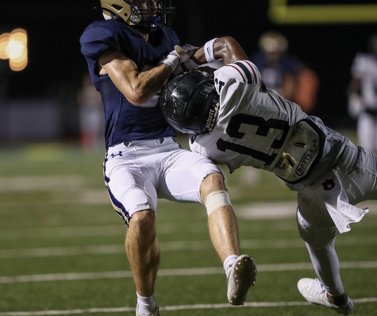 Sophomore Tyree Hines breaks up a pass              Photo Credit: TK Photography 